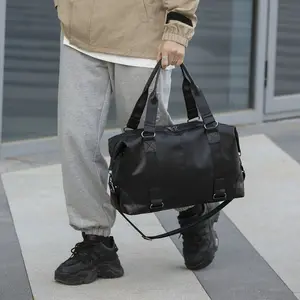 防水PU皮革手袋男士办公手提包单肩包大容量周末包黑色男士旅行行李袋