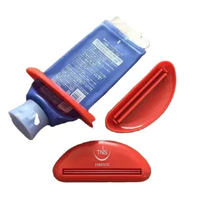 Пластиковый пресс для зубной пасты с логотипом бренда