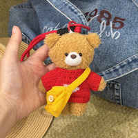 Porte-clés pendentif de sac bandoulière unique en peluche ours créatif style pull noir, accessoire de luxe pour sac et porte-clés