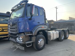 รถบรรทุกหัวลากมือสอง Sinotruk Howo NX 6x4 แบบหลังคาเรียบ พวงมาลัยซ้าย เครื่องยนต์ดีเซลยูโร 2 กำลัง 351-450 แรงม้า รับน้ำหนัก 31-40 ตัน เครื่องยนต์ Weichai สำหรับงานหนัก - Product Image 3