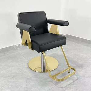 Sillón de Barbería Negro, Silla de Estilismo Hidráulica, Mueble de Salón con Reposabrazos de Cuero PU y Base Redonda para Barbería - Product Image 1