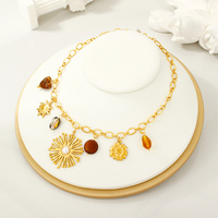 Collier à breloques multi-pièces en forme de cœur floral, en acier inoxydable plaqué or 18 carats, avec pendentifs tournesol, escargot et nœud papillon