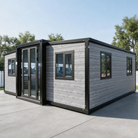 Maison conteneur pliable haut de gamme, isolée et résistante au vent, avec terrasse, toit à pignon et escalier