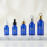 Botol Minyak Atsiri Kaca Silinder Biru Kosong Grosir 5ml 10ml 15ml 20ml 30ml 50ml 100ml Pabrik