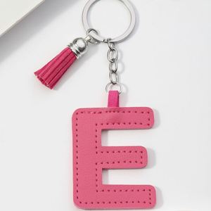 Nouveauté 2025 : Porte-clés en cuir PU avec 26 lettres anglaises et pompons en cuir colorés pour pendentif lettre nominative – Cadeau spécial - Product Image 5