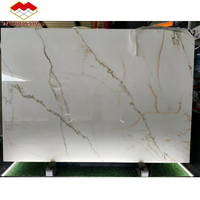 Grande dalle de marbre Calacatta blanc à veines dorées, polie, design moderne, qualité supérieure, pour hôtels, escaliers, revêtements muraux et comptoirs.