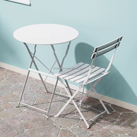 Meubles d'extérieur durables et modernes, ensemble de table et de chaises rondes colorées pour les cours, les cafés et les jardins, pour les hôtels