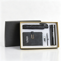 Ensemble cadeau personnalisé de luxe pour entreprise, comprenant un carnet A5 en cuir PU rigide avec couverture en PP/lin, une tasse isotherme, et une boîte cadeau avec logo personnalisé UV.