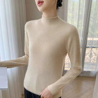 Pull élégant en cachemire à col montant pour femme, coupe ajustée, fin tricoté, idéal pour superposer
