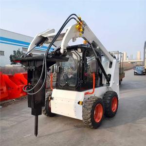 รถตักล้อยางแบบมีห้องโดยสารปิด พร้อมบุ้งกี๋ขนาด 0.35 ลูกบาศก์เมตร และหัวเจาะคอนกรีต - Product Image 1