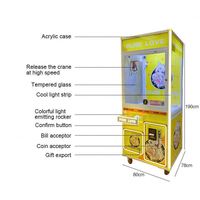 Machine de jeu d'arcade à monnayeur avec grue à griffes pour attraper les poupées