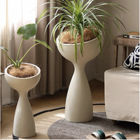 Grand pot à plantes en ciment effet marbre de forme elliptique respirant avec plateau pour la décoration du sol de la maison et du jardin