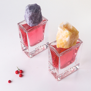 Premium 50ml Polished Clear Glass Perfume Bottles Artistic Sculpted Bottom with Resin Stone-Shaped Cap - Product Image 5