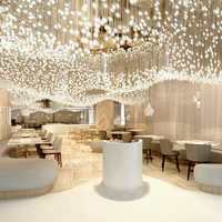 Lustre en verre exclusif ANNO pour plafond de restaurant de luxe