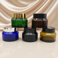Bouteille en verre borosilicate personnalisable en forme d'épaule pour sérum de soin de la peau. Pompes pulvérisatrices compatibles avec les couvercles. Capacités multiples