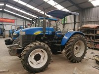 Tractor de Ruedas Usado New-Holland SNH704 |   4x4 |   Soportes de Suspensión de Tres Puntos para Múltiples Implementos