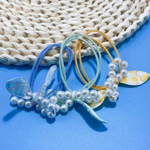 Lindos lazos para el cabello con orejas de conejo y perlas, accesorios modernos para el cabello, joyería de vendedor callejero, venta al por mayor a un yuan. - Product Image 1