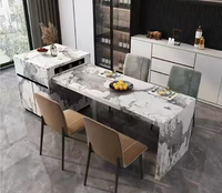 Îlot de cuisine mobile moderne en marbre avec panneau de rangement, style luxueux, fonction de refroidissement et table à manger