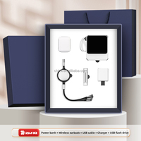 Venta caliente Premium Personalizable Corporate Gift Set Auriculares Cable Power Bank Cargador rápido USB Ideal para promociones de negocios