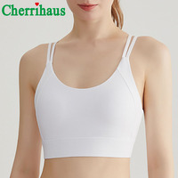 Soutien-gorge de sport haute performance résistant aux chocs pour femme, avec rembourrage fixe, fines bretelles croisées au dos, idéal pour l'entraînement, le fitness et le yoga