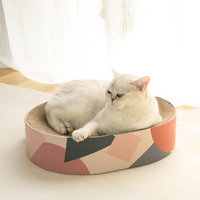 Carton ovale de grattoir de chat avec du papier ondulé pour le meulage des griffes