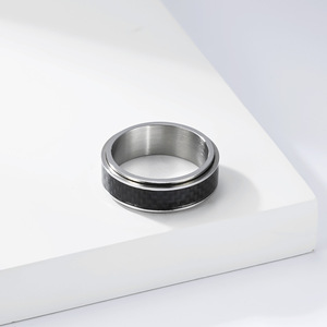 Unisex <b>titanium</b> steel and carbon fiber inlaid rotating <b>ring</b>, street style, niche and high-end, couple <b>rings</b>. - Product Image 4
