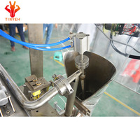 Machine d'emballage verticale compacte à grande vitesse pour lait, jus et eau UHT