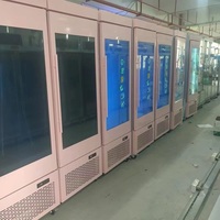 Réfrigérateur commercial MUXUE 450L vertical avec porte vitrée, affichage vidéo sur écran LCD et fonction de dégivrage automatique
