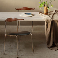 Chaise de salle à manger rétro nordique minimaliste vintage en bois massif avec dossier en fer et corne pour café et restaurant