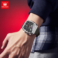 OLEVS 2942 oem logo multifonctionnel phase de lune squelette creux lumineux sport étanche bracelet en caoutchouc montre à quartz pour homme