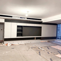 Mueble de TV a medida para pared completa, almacenamiento oculto, ecológico