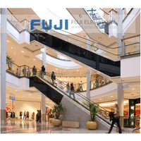 Escalator mécanique automatique FUJI, usage intensif pour centres commerciaux, avec un design contemporain