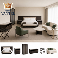 Ensemble de mobilier de chambre d'hôtel sur mesure : lit, armoire, meuble TV, table de chevet, canapé et porte-bagages pour projets de chambres d'hôtes