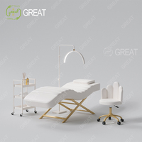 Mobilier moderne blanc pour salon de beauté lit à cils base en métal doré lit cosmétique pour spa facial à vendre