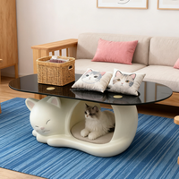 Table basse en FRP avec base creuse en forme de chat adorable et plateau en verre élégant alliant fonctionnalité et mignonnerie