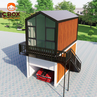 Cbox Maison conteneur modulaire préfabriquée à toit en pente, type dortoir capsule garage à deux étages, avec espace de stationnement double niveau et zone de vie