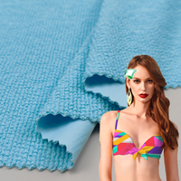 Telas al por mayor buen estiramiento de punto nylon Spandex jacquard Seersucker arrugado traje de baño tela para bikini ropa de playa