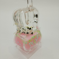 Charmant porte-stylo en acrylique en forme de violoncelle, ornement de bureau rempli de liquide scintillant et de paillettes flottantes, figurine à l'intérieur, papeterie