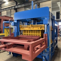 Machine de fabrication de pavés hydrauliques QT10-15 avec technologie de matériau de face colorée