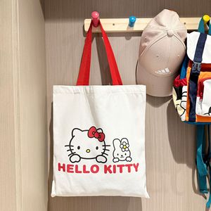 <span class=keywords><strong>K</strong></span> T Cat 2025 nouvelle mode dame dessin animé toile sac fourre-tout mignon Kitty conception grande capacité étudiant sac à bandoulière ouvert en gros - Product Image 1