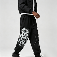 Pantalon baggy streetwear à cordon de serrage, multi-déchirures sur la cuisse, avec imprimé Kornit DTG Drip Splash All Seeing Eye Bone Rhinestone Line