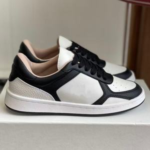 <b>Black</b> And White Color Combination <b>Lace</b> Up Men'S And Women'S Flat <b>Shoes</b> With Anti Slip And Comfortable Features - Product Image 1