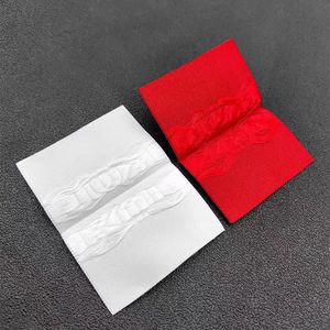 Etichette Pieghevoli Centrali di Alta Qualità con Stampa a Caldo in Lamina Opaca Goffrata Multistrato con Texture in Rilievo per Abbigliamento - Product Image 5