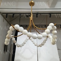 Lampe suspendue de style français personnalisée pour salon, éclairage de plafond circulaire pour escaliers, luminaire en albâtre perlé, forme d'anneau