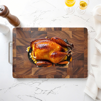 Produit Tendance 2026 : Planche à découper de luxe en bois massif à grain apparent, de forme rectangulaire, avec poignée en acier inoxydable pour accessoires de cuisine