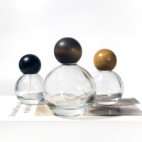À vendre parfum de luxe atomiseur pompe de pulvérisation ronde de forme sphérique 30ml 50ml 100ml parfum bouteille en verre