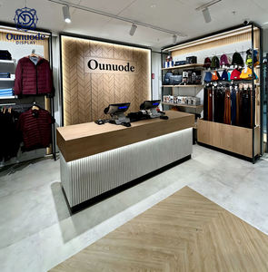 Comptoir de présentation de vêtements écologiques sur mesure avec vitrine en verre pour une conception et une aménagement intérieur clés en main - Product Image 5
