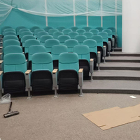 Usine vente chaude à bas prix de haute qualité pliante rangée auditorium chaises église chaises tissu d'emballage souple