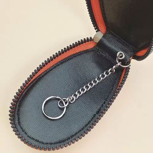 Nouvelle arrivée : Porte-clés en cuir grainé Litchi avec fermeture éclair pour hommes et femmes, organiseur de clés de voiture multifonctionnel - Product Image 4