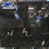 Décoration intérieure en pierre de luxe, vague de mer noire, titane cosmique, plaque de granit noir pour cuisine, plateau et comptoir d'île préfabriqués
